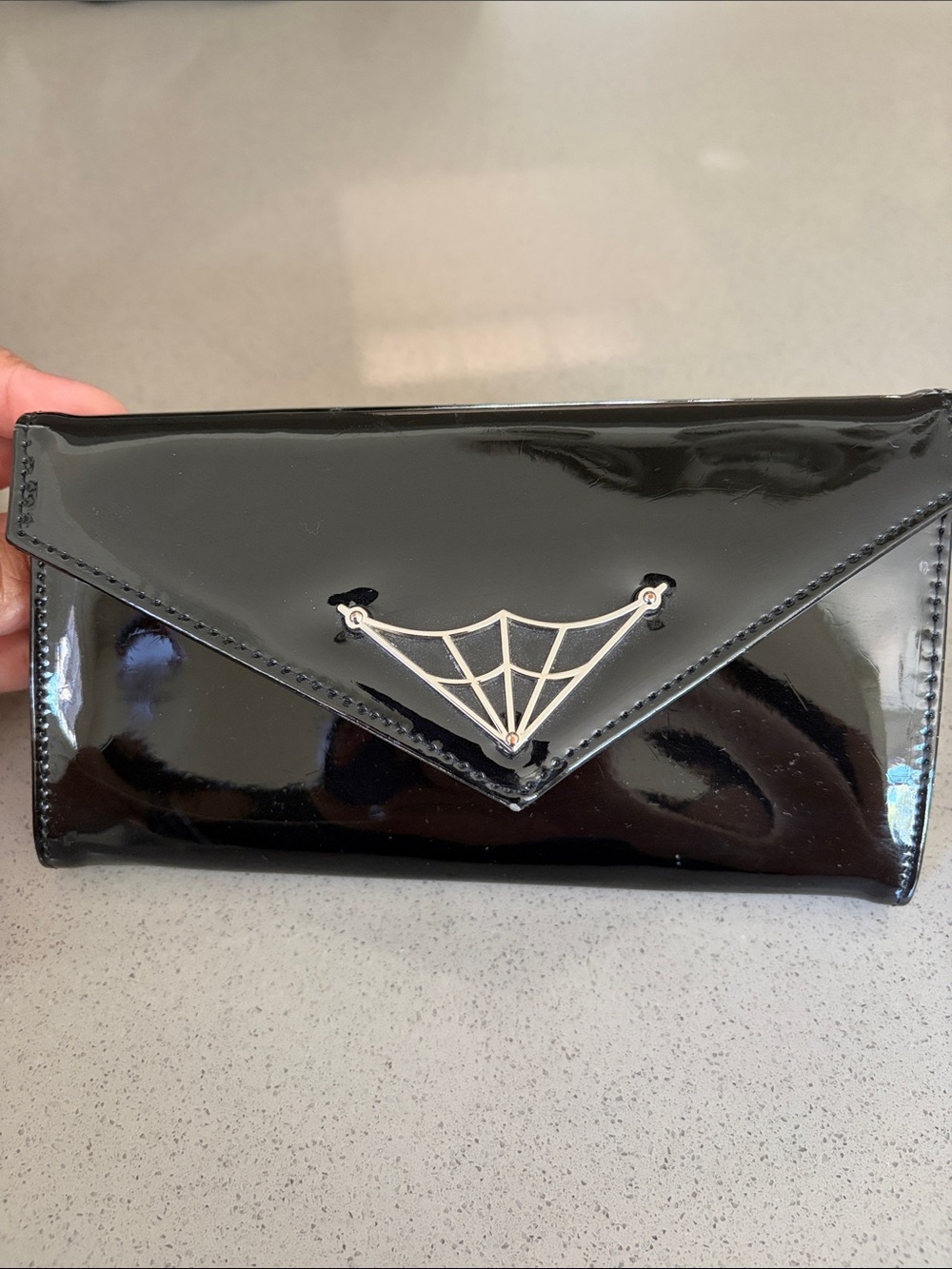 Banned Patent Black Envelope Clutch with Silver Web Detail